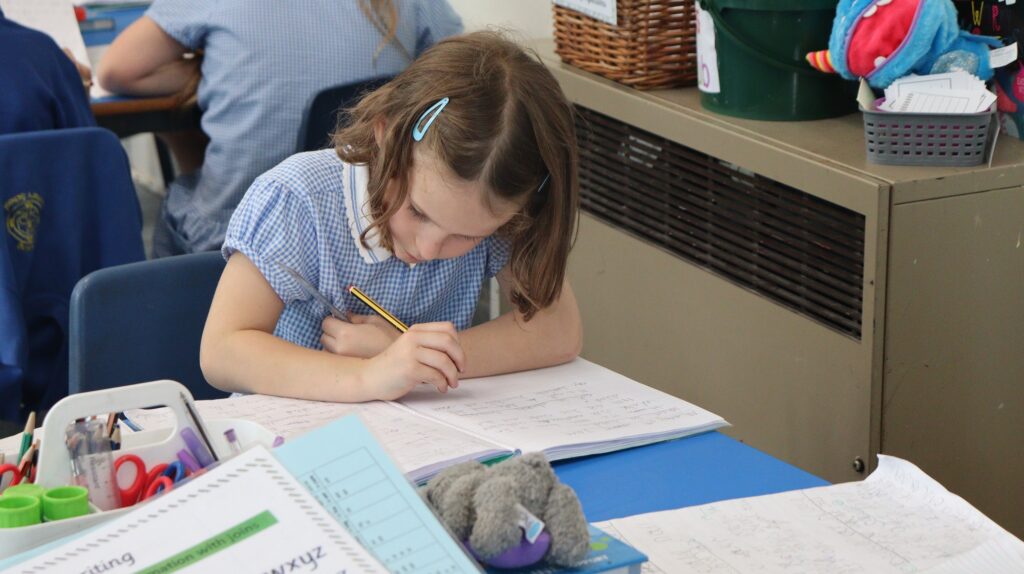 Pupil at Exning Primary School studying