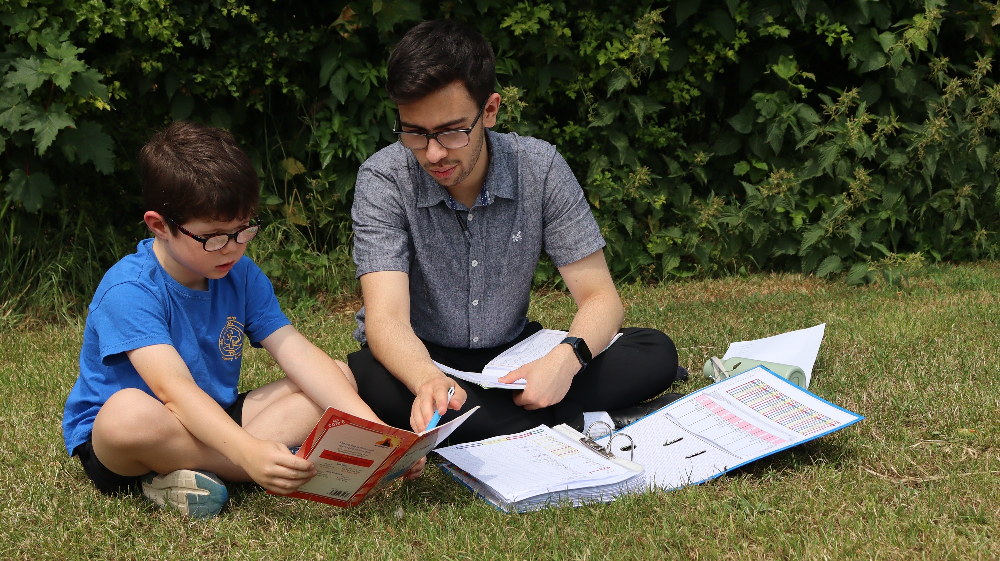 A teacher with a pupil at Exning Primary School