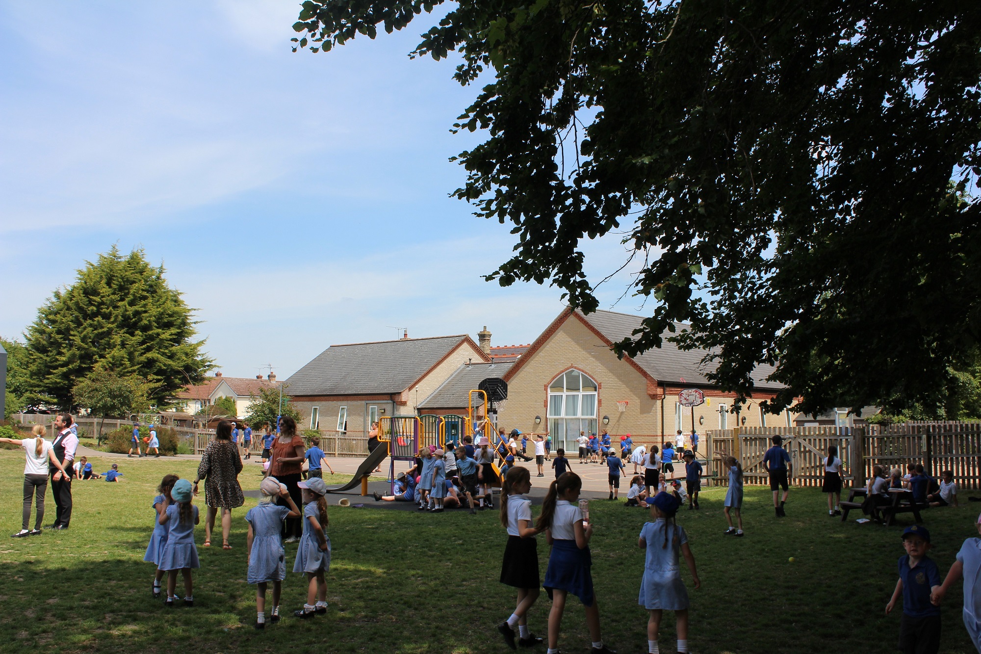 Pupils on the field at Exning Primary School