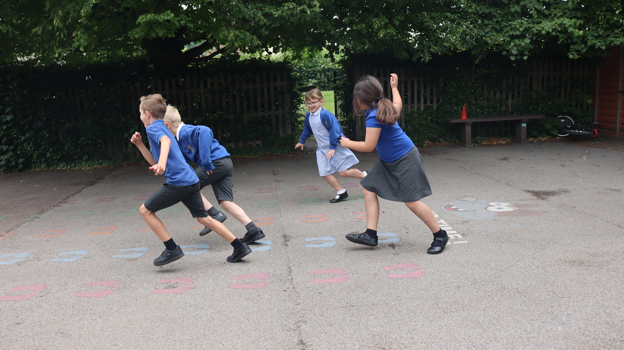 Pupils running at Exning Primary School